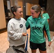 27 May 2025; Republic of Ireland and Arsenal's Katie McCabe with team-mate Saoirse Noonan, right, on her arrival at their team hotel in Istanbul, following Arsenal's UEFA Women's Champions League Final victory, ahead of her side's UEFA Women's Nations League League B match against Türkiye on Friday. Photo by Stephen McCarthy/Sportsfile