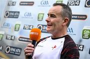 28 May 2025; Louth manager Fergal Reel is interviewed before the Dalata Hotel Group GAA Football All-Ireland U20 Championship final match between Louth and Tyrone at BOX-IT Athletic Grounds in Armagh. Photo by Seb Daly/Sportsfile