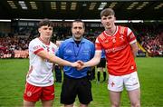 28 May 2025; Referee Noel Mooney with Tyrone captain Joey Clarke, left, and Louth captain Sean Callaghan before the Dalata Hotel Group GAA Football All-Ireland U20 Championship final match between Louth and Tyrone at BOX-IT Athletic Grounds in Armagh. Photo by Seb Daly/Sportsfile
