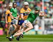 25 May 2025; William O'Donoghue of Limerick is tackled by Cian Galvin of Clare during the Munster GAA Hurling Senior Championship Round 5 match between Limerick and Clare at TUS Gaelic Grounds in Limerick. Photo by Tom Beary/Sportsfile