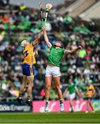 25 May 2025; Ryan Taylor of Clare in action against Gearóid Hegarty of Limerick during the Munster GAA Hurling Senior Championship Round 5 match between Limerick and Clare at TUS Gaelic Grounds in Limerick. Photo by Tom Beary/Sportsfile