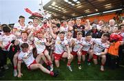 28 May 2025; The Tyrone team celebrate with the trophy after their victory in the Dalata Hotel Group GAA Football All-Ireland U20 Championship final match between Louth and Tyrone at BOX-IT Athletic Grounds in Armagh. Photo by Oliver McVeigh/Sportsfile