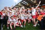 28 May 2025; The Tyrone team celebrate with the trophy after their victory in the Dalata Hotel Group GAA Football All-Ireland U20 Championship final match between Louth and Tyrone at BOX-IT Athletic Grounds in Armagh. Photo by Oliver McVeigh/Sportsfile