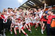 28 May 2025; The Tyrone team celebrate with the trophy after their victory in the Dalata Hotel Group GAA Football All-Ireland U20 Championship final match between Louth and Tyrone at BOX-IT Athletic Grounds in Armagh. Photo by Oliver McVeigh/Sportsfile