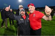28 May 2025; Tyrone manager Paul Devlin, right, and team kit man Gerard O'Neill after the All Ireland Dalata Hotel Group GAA Football All-Ireland U20 Championship final match between Louth and Tyrone at BOX-IT Athletic Grounds in Armagh. Photo by Oliver McVeigh/Sportsfile