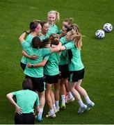 29 May 2025; Republic of Ireland players, inlcuding Caitlin Hayes, Katie McCabe, Louise Quinn, Chloe Mustaki and Amber Barrett celebrate during a Republic of Ireland women's training session at Esenler Erok Stadium in Istanbul, Türkiye. Photo by Stephen McCarthy/Sportsfile