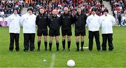 24 May 2025; Referee Brendan Cawley with his match officials before the GAA Football All-Ireland Senior Championship Round 1 match between Louth and Monaghan at Cedral St Conleth's in Newbridge, Kildare. Photo by Piaras Ó Mídheach/Sportsfile