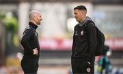 30 May 2025; Bohemians assistant manager Stephen O'Donnell, left, and Derry City player co-ordinator Patrick McEleney before the SSE Airtricity Men's Premier Division match between Bohemians and Derry City at Dalymount Park in Dublin. Photo by Seb Daly/Sportsfile