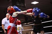30 May 2025; Kayla Harris of St Monica's BC, right, in action against Danielle Smithers of Swords BC during their bout at the 2025 National Senior Cadet Championship Finals at the National Boxing Stadium in Dublin. Photo by David Fitzgerald/Sportsfile