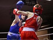 30 May 2025; Darragh Cunningham Of Dealgan BC, left, in action against Ryan Seery of Glasnevin BC during their bout at the 2025 National Senior Cadet Championship Finals at the National Boxing Stadium in Dublin. Photo by David Fitzgerald/Sportsfile