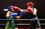 30 May 2025; Heidi Carolan of East Meath BC, right, in action against Kaiden McKenna of Castleblayney BC during their bout at the 2025 National Senior Cadet Championship Finals at the National Boxing Stadium in Dublin. Photo by David Fitzgerald/Sportsfile