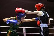 30 May 2025; Heidi Carolan of East Meath BC, right, in action against Kaiden McKenna of Castleblayney BC during their bout at the 2025 National Senior Cadet Championship Finals at the National Boxing Stadium in Dublin. Photo by David Fitzgerald/Sportsfile