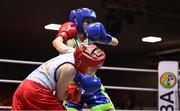 30 May 2025; Rylee Finn of St Nicholas BC in action against Pat Stokes of Olympic BC during their bout at the 2025 National Senior Cadet Championship Finals at the National Boxing Stadium in Dublin. Photo by David Fitzgerald/Sportsfile