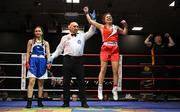 30 May 2025; Abby Murray of Muskerry BC, right, celebrates after winning her bout against Evelyn Spicer of Enniskerry BC during the 2025 National Senior Cadet Championship Finals at the National Boxing Stadium in Dublin. Photo by David Fitzgerald/Sportsfile