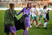 30 May 2025; Republic of Ireland goalkeeper Grace Moloney, left, takes the tracksuit top of teammate Courtney Brosnan before the UEFA Women's Nations League, League B match between Türkiye and Republic of Ireland at Esenler Stadium in Istanbul, Türkiye. Photo by Stephen McCarthy/Sportsfile