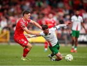 30 May 2025; Evan McLaughlin of Cork City is tackled by John Martin of Shelbourne during the SSE Airtricity Men's Premier Division match between Cork City and Shelbourne at Turner's Cross in Cork. Photo by Michael P Ryan/Sportsfile