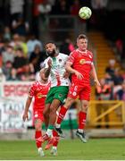 30 May 2025; Djenairo Daniels of Cork City in action against JJ Lunney of Shelbourne during the SSE Airtricity Men's Premier Division match between Cork City and Shelbourne at Turner's Cross in Cork. Photo by Michael P Ryan/Sportsfile