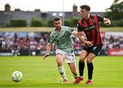 30 May 2025; Dayle Rooney of Bohemians in action against Michael Duffy of Derry City during the SSE Airtricity Men's Premier Division match between Bohemians and Derry City at Dalymount Park in Dublin. Photo by Seb Daly/Sportsfile