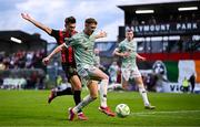 30 May 2025; Ronan Boyce of Derry City in action against Dayle Rooney of Bohemians during the SSE Airtricity Men's Premier Division match between Bohemians and Derry City at Dalymount Park in Dublin. Photo by Seb Daly/Sportsfile