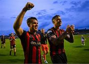 30 May 2025; Bohemians players Dayle Rooney, left, and Rob Cornwall after their side's victory in the SSE Airtricity Men's Premier Division match between Bohemians and Derry City at Dalymount Park in Dublin. Photo by Seb Daly/Sportsfile
