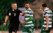30 May 2025; Referee Kevin O'Sullivan and Aaron Greene, right, and Danny Mandroiu of Shamrock Rovers during the SSE Airtricity Men's Premier Division match between Shamrock Rovers and Galway United at Tallaght Stadium in Dublin. Photo by Piaras Ó Mídheach/Sportsfile