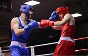 30 May 2025; Darren O’Toole of Jobstown BC, left, in action against Niall O’Driscoll of Muskerry BC during their bout at the 2025 National Senior Cadet Championship Finals at the National Boxing Stadium in Dublin. Photo by David Fitzgerald/Sportsfile