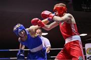 30 May 2025; John Ward of Monivea BC, left, in action against Martin Collins of Baldoyle BC during their bout at the 2025 National Senior Cadet Championship Finals at the National Boxing Stadium in Dublin. Photo by David Fitzgerald/Sportsfile