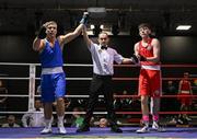 30 May 2025; John Ward of Monivea BC, left, celebrates after winning his bout against Martin Collins of Baldoyle BC during the 2025 National Senior Cadet Championship Finals at the National Boxing Stadium in Dublin. Photo by David Fitzgerald/Sportsfile