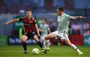 30 May 2025; Robbie Benson of Derry City in action against Keith Buckley of Bohemians during the SSE Airtricity Men's Premier Division match between Bohemians and Derry City at Dalymount Park in Dublin. Photo by Seb Daly/Sportsfile