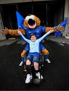31 May 2025; Leinster mascot Leo the Lion with Leinster supporter Harry Cassidy from Rathfarnham, Dublin, before the United Rugby Championship quarter-final match between Leinster and Scarlets at the Aviva Stadium in Dublin. Photo by Seb Daly/Sportsfile