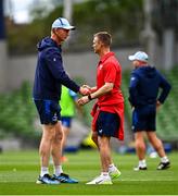 31 May 2025; Leinster head coach Leo Cullen, left, and Scarlets head coach Dwayne Peel before the United Rugby Championship quarter-final match between Leinster and Scarlets at the Aviva Stadium in Dublin. Photo by Tyler Miller/Sportsfile