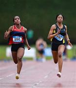 31 May 2025; Adaora Nnemeka of St Brogans Bandon, Cork, right, races ahead of Michelle Nnadi of Dominican College Taylors Hill Galway, on her way to winning the Junior Girls 100m Sprint during the 123.ie All-Ireland Schools Track and Field Championships at Tullamore Harriers Athletics Club in Offaly. Photo by Shauna Clinton/Sportsfile