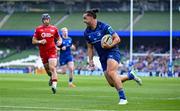31 May 2025; James Lowe of Leinster scores his side's first try during the United Rugby Championship quarter-final match between Leinster and Scarlets at the Aviva Stadium in Dublin. Photo by Brendan Moran/Sportsfile