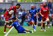 31 May 2025; Vaea Fifita of Scarlets is tackled by Hugo Keenan of Leinster during the United Rugby Championship quarter-final match between Leinster and Scarlets at the Aviva Stadium in Dublin. Photo by Tyler Miller/Sportsfile