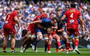 31 May 2025; Ryan Baird of Leinster is tackled by Ryan Elias and Josh Macleod of Scarlets during the United Rugby Championship quarter-final match between Leinster and Scarlets at the Aviva Stadium in Dublin. Photo by Brendan Moran/Sportsfile