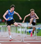 31 May 2025; Adam Rochford of Rice College Ennis, Clare, left, on his way to winning the Minor Boys 75m Hurdles during the 123.ie All-Ireland Schools Track and Field Championships at Tullamore Harriers Athletics Club in Offaly. Photo by Shauna Clinton/Sportsfile