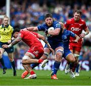 31 May 2025; Joe McCarthy of Leinster sidesteps Vaea Fifita of Scarlets during the United Rugby Championship quarter-final match between Leinster and Scarlets at the Aviva Stadium in Dublin. Photo by Brendan Moran/Sportsfile