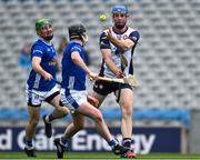 31 May 2025; Johnny Glynn of New York in action against Stephen Sheridan, left, and Cillian Sheanon of Cavan during the Lory Meagher Cup final match between Cavan and New York at Croke Park in Dublin. Photo by Stephen Marken/Sportsfile