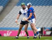 31 May 2025; AJ Willis of New York and Matthew Hynes of Cavan tussle during the Lory Meagher Cup final match between Cavan and New York at Croke Park in Dublin. Photo by Stephen Marken/Sportsfile