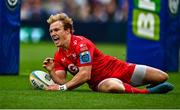 31 May 2025; Blair Murray of Scarlets dives over to score his side's second try during the United Rugby Championship quarter-final match between Leinster and Scarlets at the Aviva Stadium in Dublin. Photo by Tyler Miller/Sportsfile