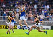 31 May 2025; Paddy McCormack of Tipperary is tackled by Timmy Kelly, left, and Eoghan Lyng of Kilkenny during the oneills.com GAA Hurling All-Ireland U20 Championship final match between Kilkenny and Tipperary at UPMC Nowlan Park in Kilkenny. Photo by Ray McManus/Sportsfile