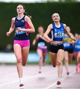 31 May 2025; Faye Mannion of Coláiste Muire, Clare, left, who finished first, and Freya Bateman of Mount Mercy Cork, who finished second, race to the finish line in the Inter Girls 800m during the 123.ie All-Ireland Schools Track and Field Championships at Tullamore Harriers Athletics Club in Offaly. Photo by Shauna Clinton/Sportsfile