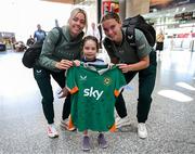 31 May 2025; Republic of Ireland's Denise O’Sullivan, left, and Saoirse Noonan present a signed Republic of Ireland jersey to supporter Georgie Ring, age 5, from Carrigaline, Cork, on the team's arrival at Cork International Airport ahead of their UEFA Women's Nations League match against Slovenia at Páirc Uí Chaoimh in Cork on Tuesday. Photo by Stephen McCarthy/Sportsfile