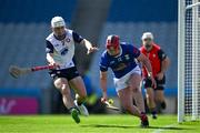 31 May 2025; Sean Keating of Cavan in action against Eanna Barry of New York during the Lory Meagher Cup final match between Cavan and New York at Croke Park in Dublin. Photo by Stephen Marken/Sportsfile