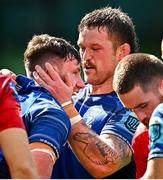 31 May 2025; Hugo Keenan of Leinster, left, celebrates with teammate Andrew Porter after scoring their side's fourth try during the United Rugby Championship quarter-final match between Leinster and Scarlets at the Aviva Stadium in Dublin. Photo by Seb Daly/Sportsfile