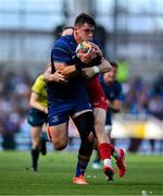 31 May 2025; Dan Sheehan of Leinster is tackled by Ioan Lloyd of Scarlets in the lead up to his side's fourth try during the United Rugby Championship quarter-final match between Leinster and Scarlets at the Aviva Stadium in Dublin. Photo by Brendan Moran/Sportsfile