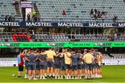 31 May 2025; Munster players huddle before the United Rugby Championship quarter-final match between Hollywoodbets Sharks and Munster at Kings Park Stadium in Durban, South Africa. Photo by Shaun Roy/Sportsfile