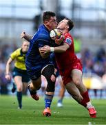 31 May 2025; Dan Sheehan of Leinster is tackled by Ioan Lloyd of Scarlets in the lead up to his side's fourth try during the United Rugby Championship quarter-final match between Leinster and Scarlets at the Aviva Stadium in Dublin. Photo by Brendan Moran/Sportsfile