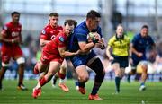 31 May 2025; Dan Sheehan of Leinster is tackled by Ioan Lloyd of Scarlets in the lead up to his side's fourth try during the United Rugby Championship quarter-final match between Leinster and Scarlets at the Aviva Stadium in Dublin. Photo by Brendan Moran/Sportsfile