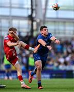 31 May 2025; Dan Sheehan of Leinster blocks a kick by Arhie Hughes of Scarlets in the lead up to his side's fourth try during the United Rugby Championship quarter-final match between Leinster and Scarlets at the Aviva Stadium in Dublin. Photo by Brendan Moran/Sportsfile